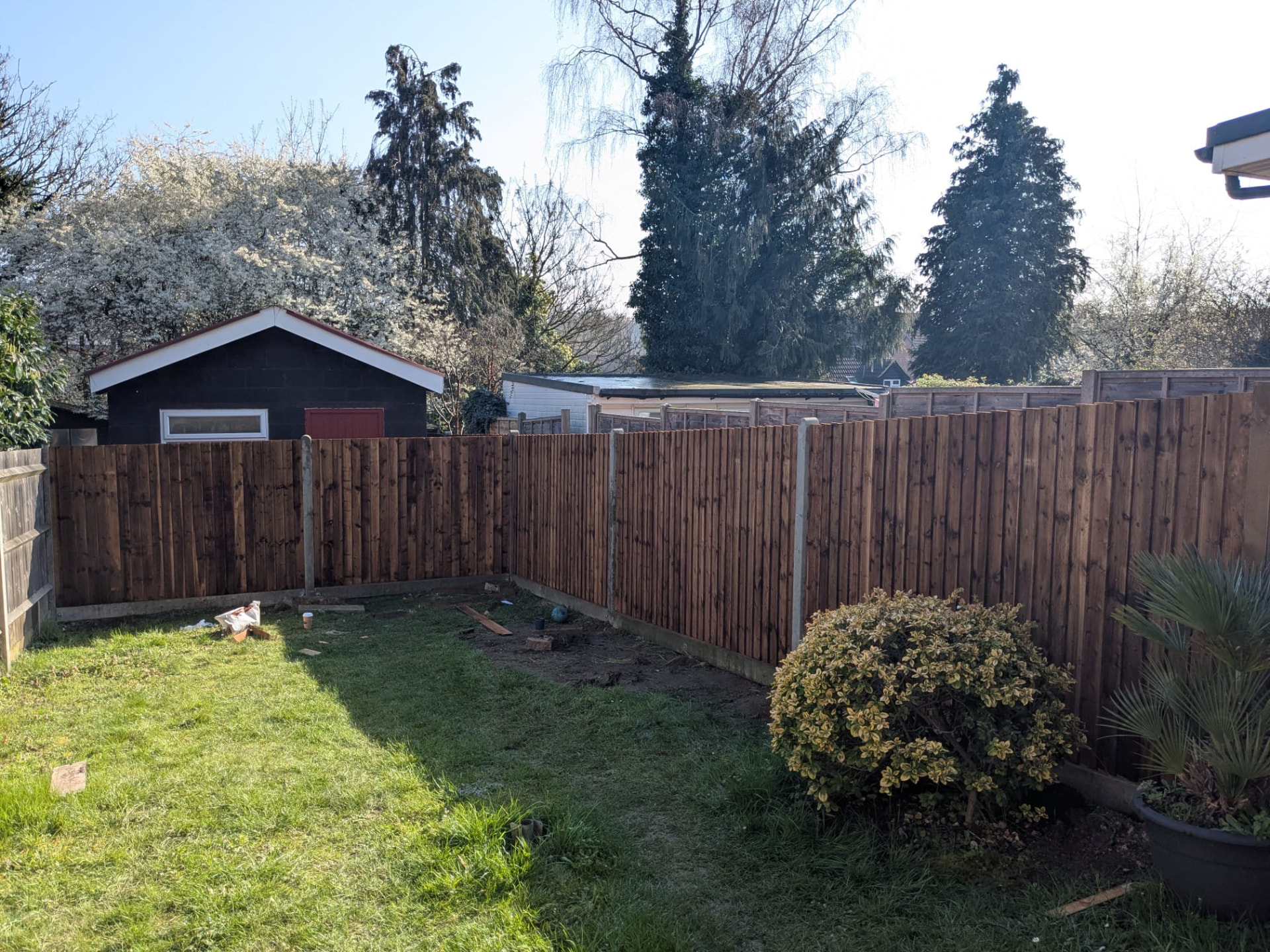 Real King & Son project — new closeboard timber fencing installed around a family garden